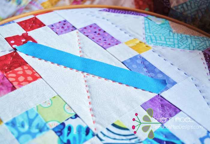 If you are quilting a long straight line and need a ‘guide’ try using painters tape and just stitch along side of it!  It helps and the tape pulls right off and you can use it a couple more times before the ‘stick’ is worn out.  