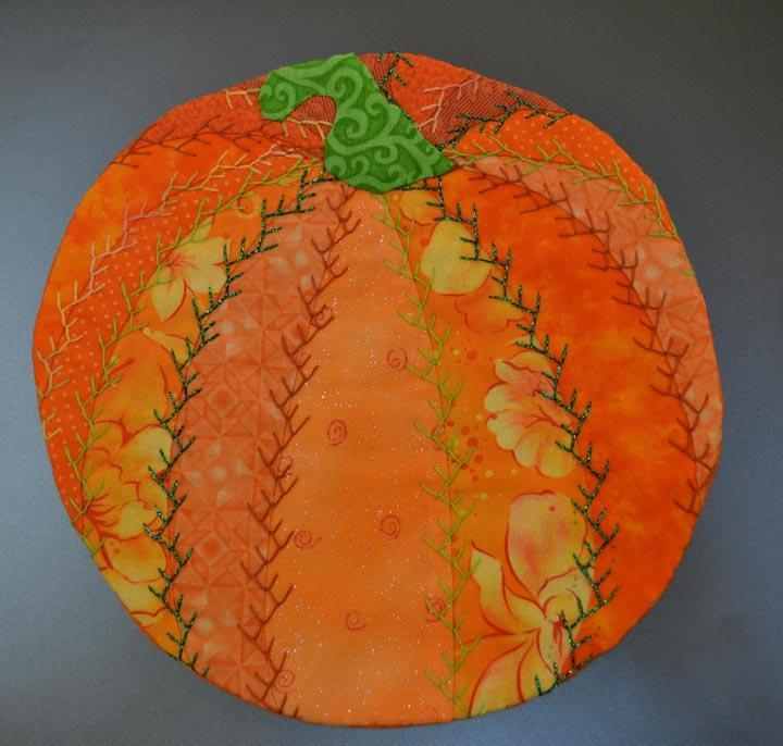 embroidered pumpkin mug rug