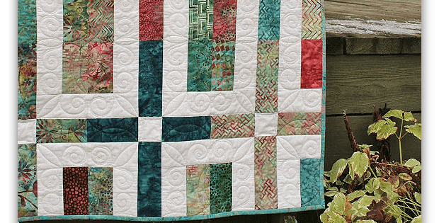 Quilting Digest - Fabric panels that have motifs in squares of various  sizes often offer great opportunities for creativity. The following example  is one way to give such a panel your own