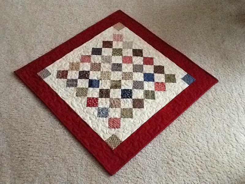 this-pretty-table-topper-is-simply-charming-quilting-digest