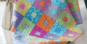 This playful quilt is perfect for a new baby  quilting digest