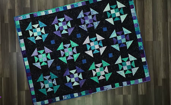 Updated Churn Dash Blocks Star in a Striking Quilt - Quilting Digest