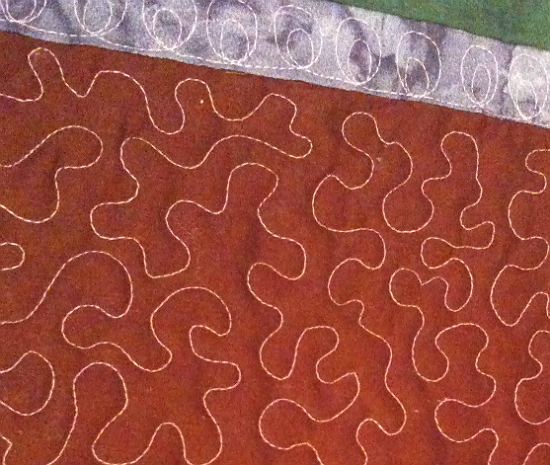 meandering stitch free motion quilting pattern