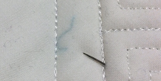 How to Remove Stray Threads Under a Quilt Top