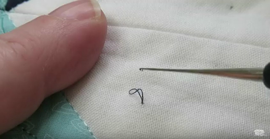 How to Remove Stray Threads Under a Quilt Top