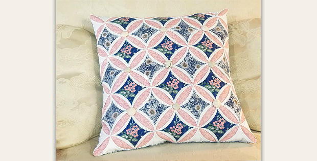 cathedral window patchwork cushion