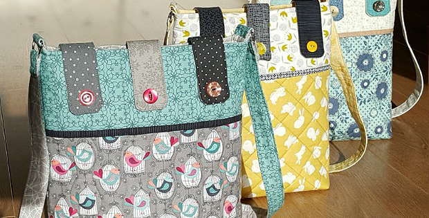 Button Tab Messenger Bag