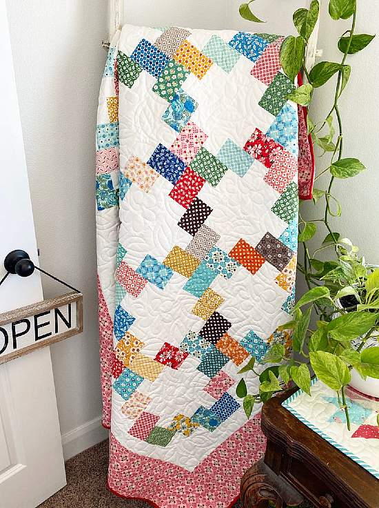 create-an-easy-and-charming-quilt-from-layer-cake-squares-quilting-digest