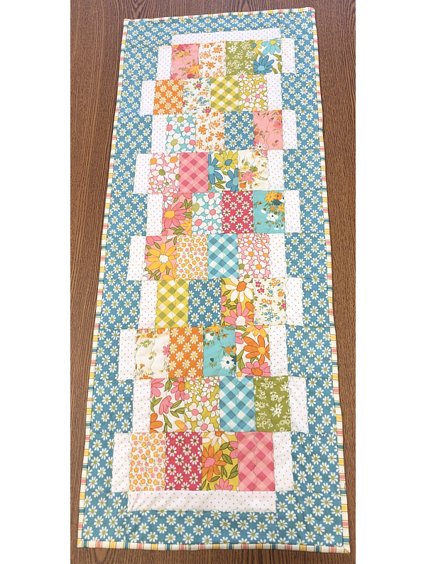 Color Dances Across This Festive Runner Quilting Digest