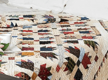Scrappy Bear Paw Quilt