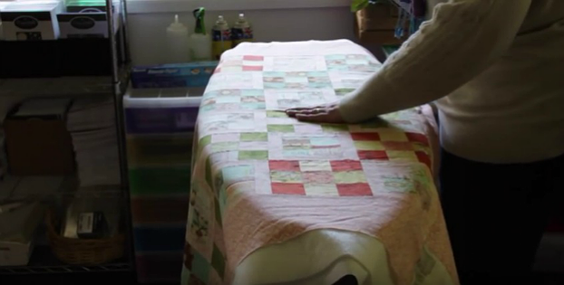 Easily Baste a Quilt on Your Ironing Board
