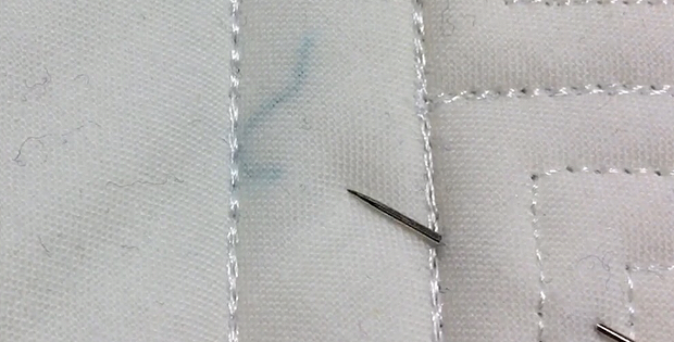 How to Remove Stray Threads Under a Quilt Top