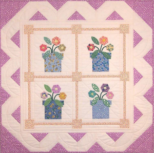 Pretty Flower Blocks Make a Lovely Wall or Table Quilt - Quilting Digest