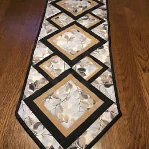 Feature Favorite Prints In This Table Runner - Quilting Digest