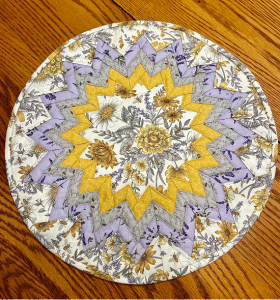 Feature a Beautiful Print in this Folded Fabric Mat - Quilting Digest